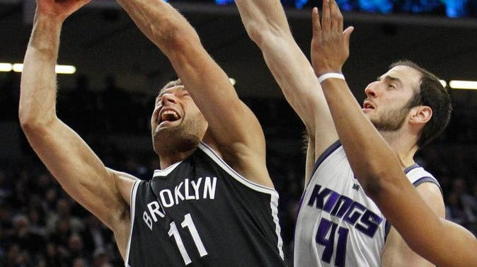 Brooklyn Nets center Brook Lopez drives to the basket against...
