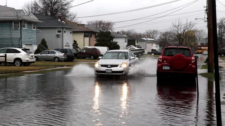 Flood waters rise on South Ocean Avenue in Freeport after...