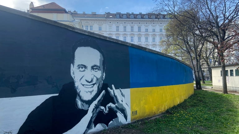A picture of Alexei Navalny on a mural in Vienna,...