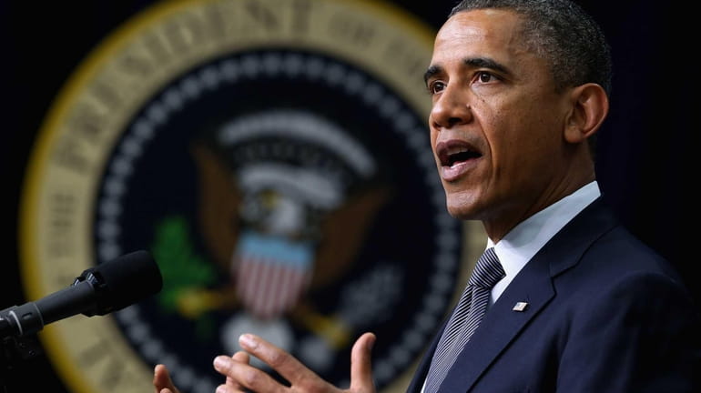U.S. President Barack Obama announces his administration's new gun law...
