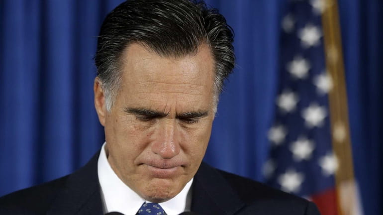 Republican presidential candidate Mitt Romney makes comments on the killing...