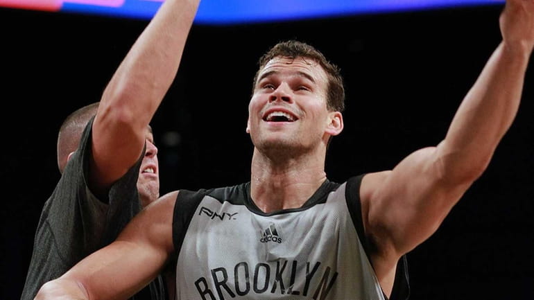 Kris Humphries works inside during Brooklyn Nets practice at the...