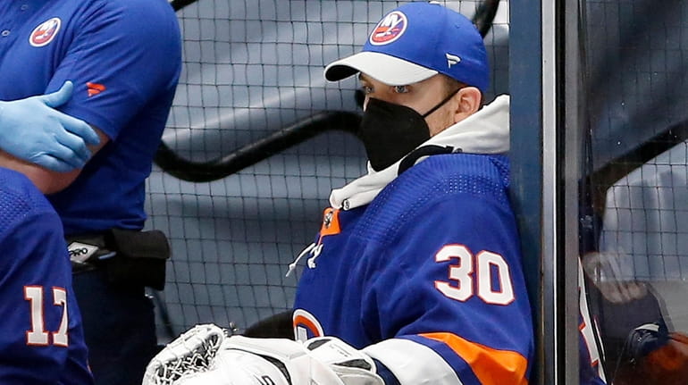 Ilya Sorokin of the New York Islanders looks on from...