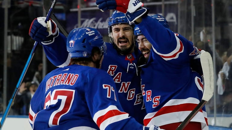 Chris Kreider of the Rangers celebrates his first-period goal against the Lightning during...