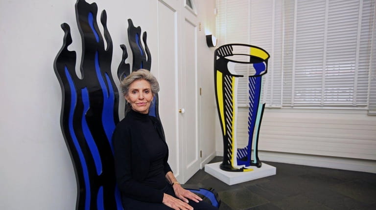 Dorothy Lichtenstein sits on her late husband's work, "Brushstroke Chair...