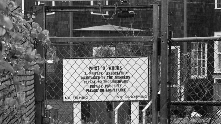 A photograph from 1976 of a gate outside the entrance to Point...