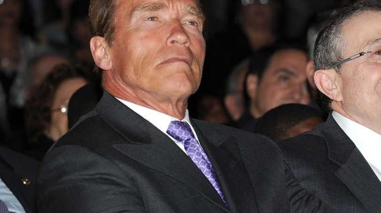 Former California Governor Arnold Schwarzenegger accepts an award at Skirball...