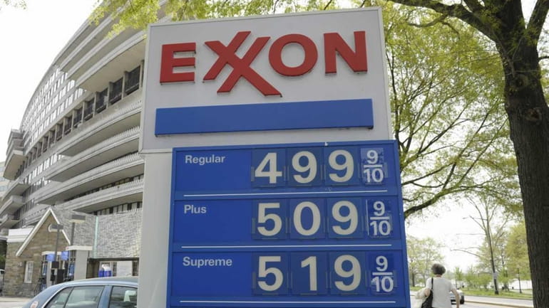 Gas prices above $5 a gallon are seen on a...