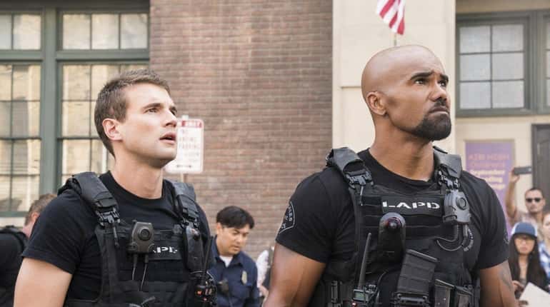 Alex Russell     and Shemar Moore, right, star in "S.W.A.T."