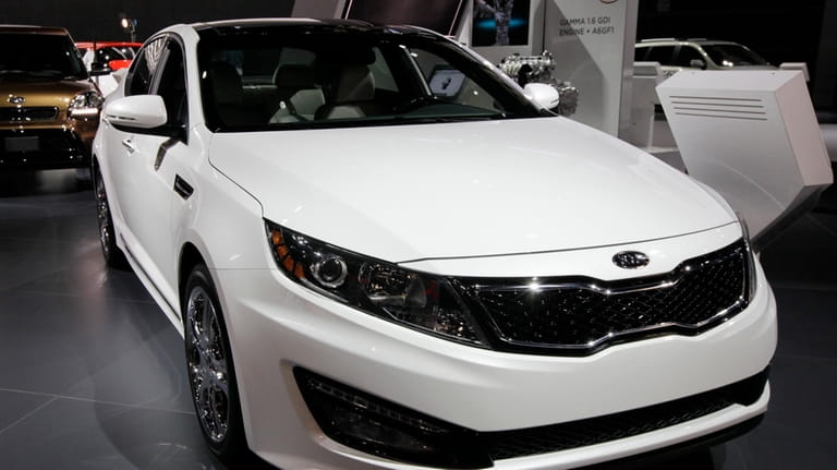 A 2013 Kia Optima is displayed at the Chicago Auto...