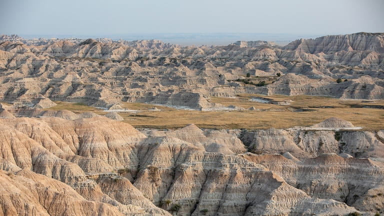 The Badlands National Park is pictured from near Sage Creek...