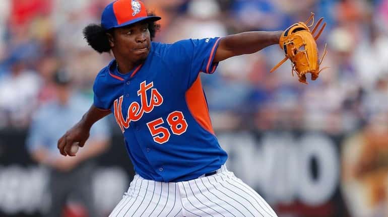 Jenrry Mejia pitches during a game against the Detroit Tigers...