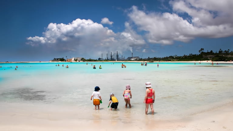 Children playing on the beach in Aruba. 