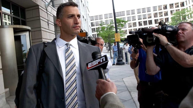Andy Pettitte leaves the U.S. District Court after testifying in...