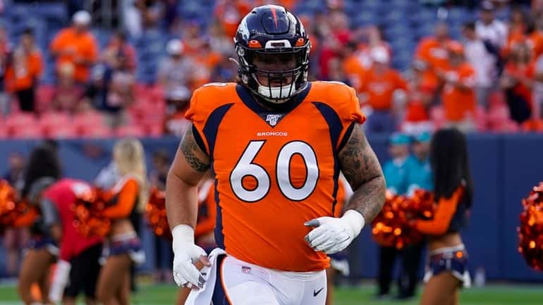 Broncos offensive guard Connor McGovern takes the field during an NFL...