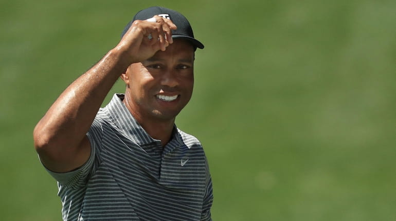 Tiger Woods looks on during a practice round prior to...