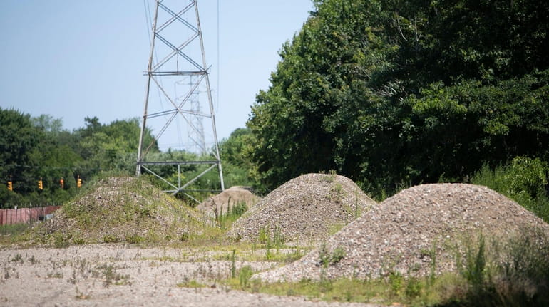 Illegally dumped dirt mounds at Brentwood State Park during a...