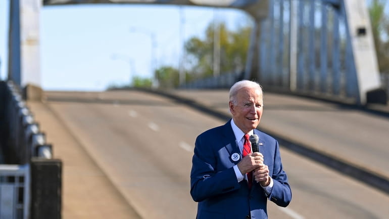President Joe Biden speaks near the Edmund Pettus Bridge in...