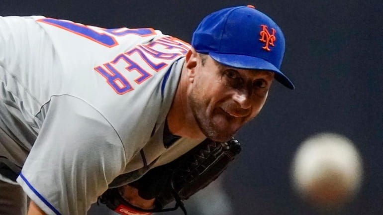 Mets starter Max Scherzer throws during the sixth inning of...