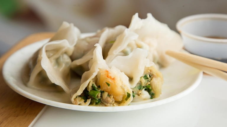 Delicate dumplings are stuffed with shrimp, pork and chives at...