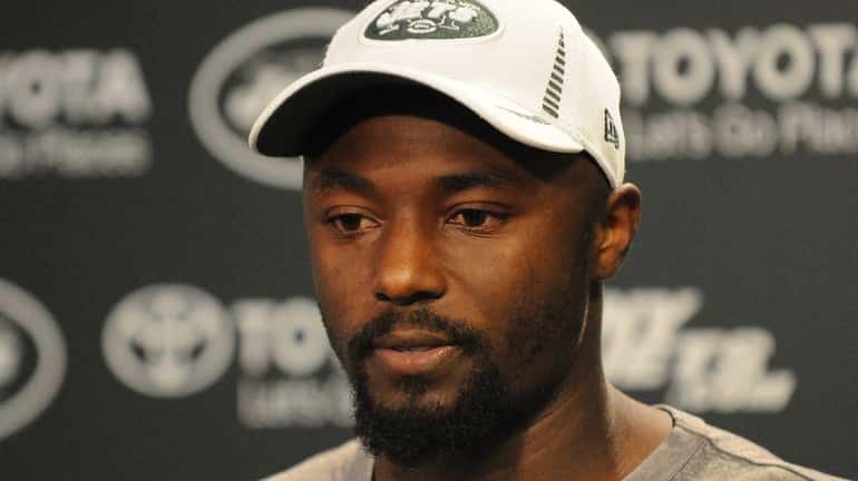 Santonio Holmes speaks to the media about his injury and...