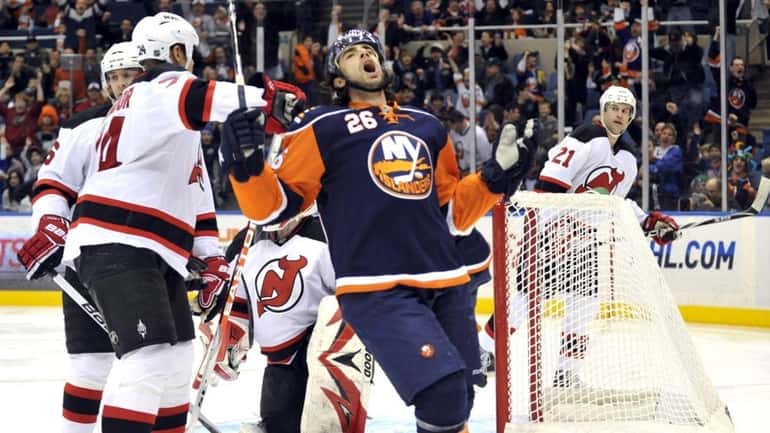 Matt Moulson of the Islanders celebrates his first-period goal against...
