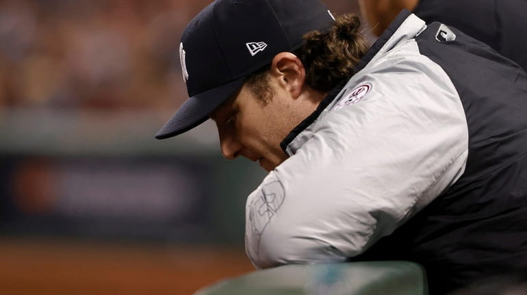 Gerrit Cole of the Yankees looks on against the Boston...