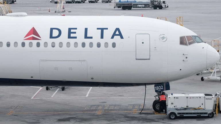 Delta planes sit on the tarmac at John F. Kennedy...