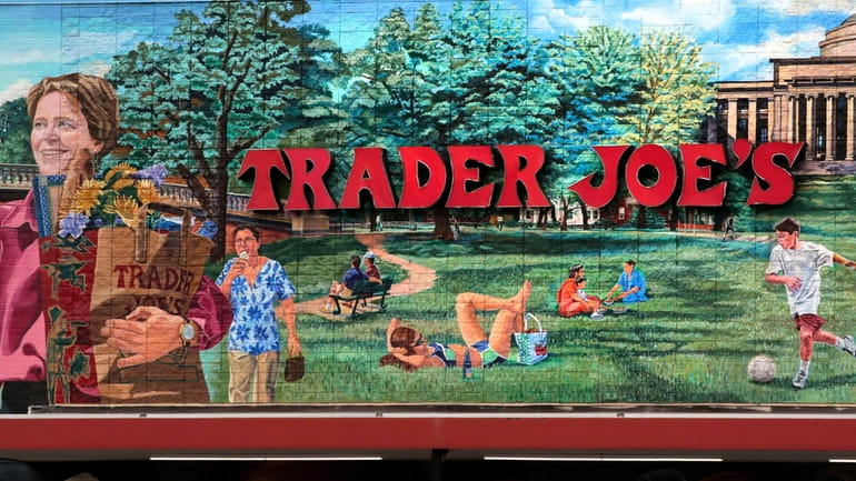 The Trader Joe's logo hangs on a mural, Aug. 13,...