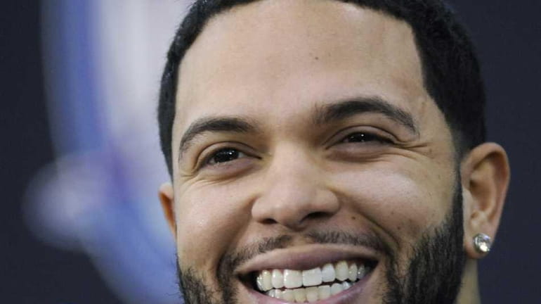 New Jersey Nets Deron Williams smiles as he talks to...