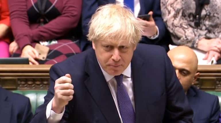 British Prime Minister Boris Johnson addressing MPs at the House...