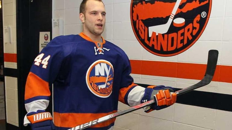 Rob Schremp #44 of the New York Islanders walks to...