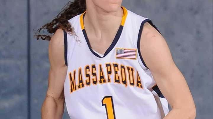 Massapequa's Morgan Roessler looks to pass in the fourth quarter...