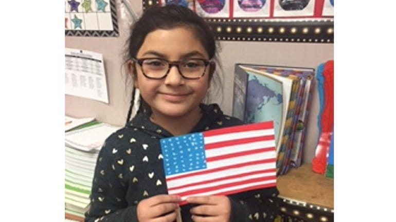 Kidsday reporter Veronica Duran shows off her homemade American flag.