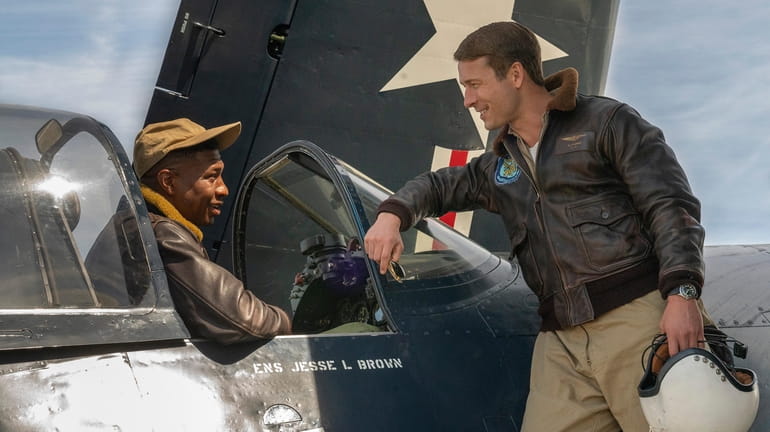 This image released by Sony Pictures shows Jonathan Majors, left,...