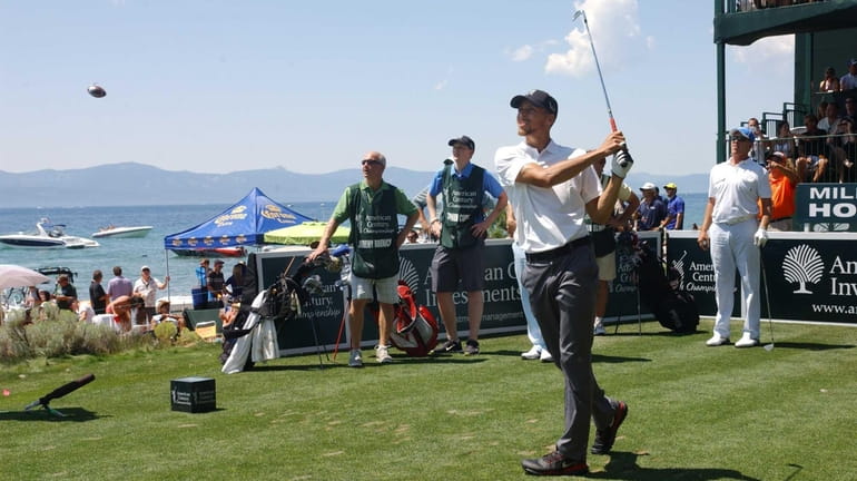 Golden State Warriors' Stephen Curry watches a tee shot during...