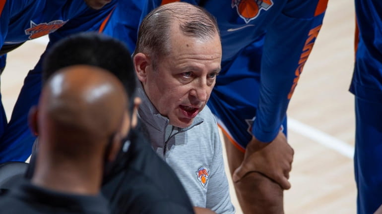 Knicks head coach Tom Thibodeau draws up plays during a...