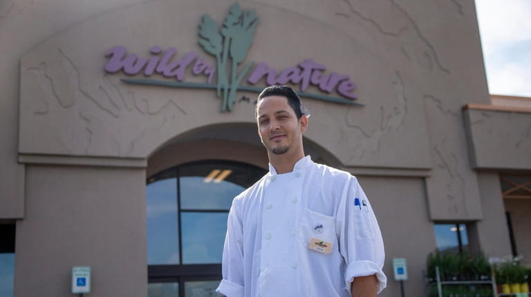 Yave Infante, a deli clerk and cook at Wild by...