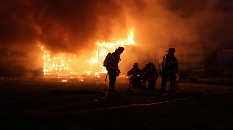 Firefighters respond to a house fire early Saturday, Jan. 28,...
