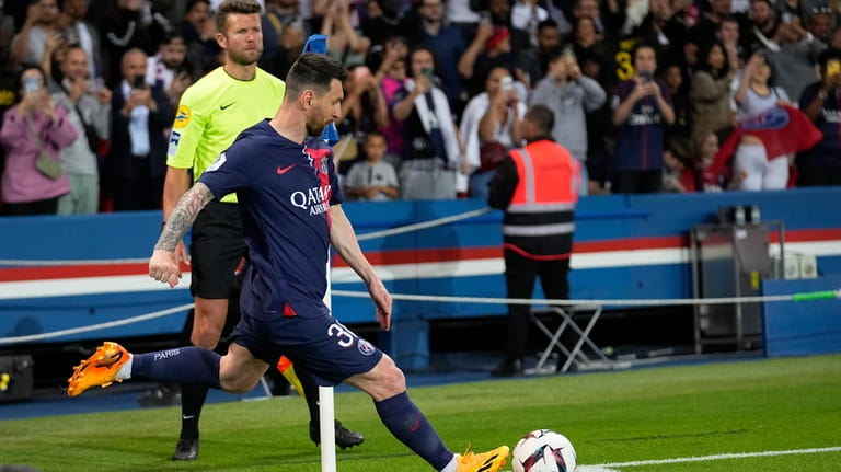 PSG's Lionel Messi kicks a corner shot during the French...