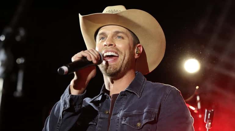 Dustin Lynch performs at a pre-CMA party on Nov. 12, 2019,...