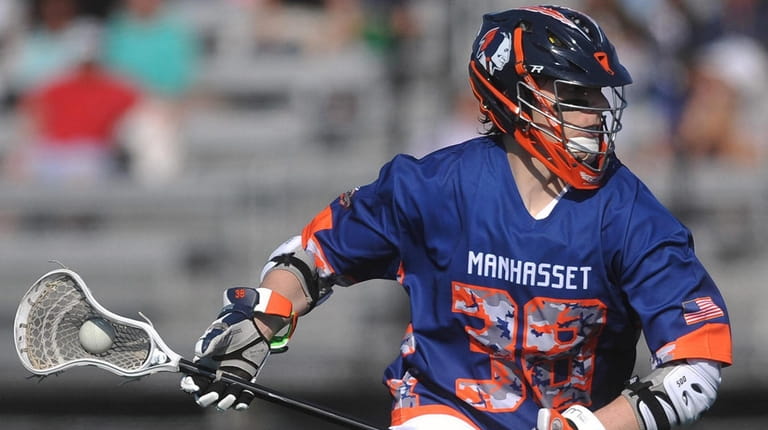 Michael Farrell playing lacrosse for Manhasset High School in 2018.