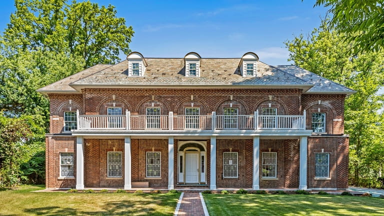 Priced at $4.95 million, this Colonial on North Drive in...