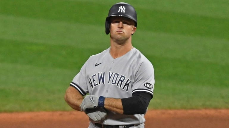 The Yankees' Brett Gardner reacts after hitting a RBI double in...