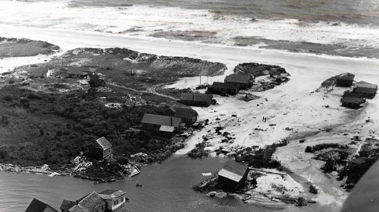 This aerial view of Fire Island shows the damage from...