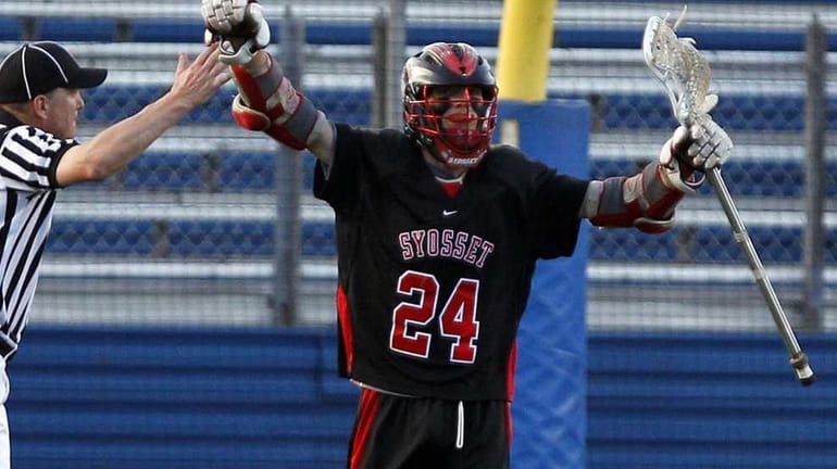 Syosset's Jon Camposa celebrates a goal in the first half....
