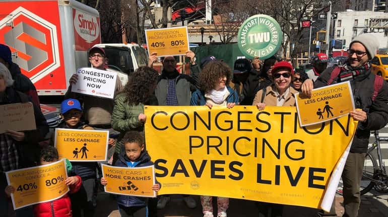 Supporters of congestion pricing -- advocates and transit union representatives...