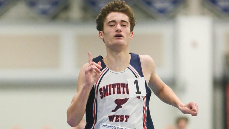 Smithtown West's Michael Danzi wins the 1000-meter run during the...