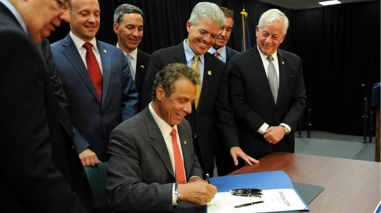 New York governor Andrew Cuomo, signs the zombie house bill...