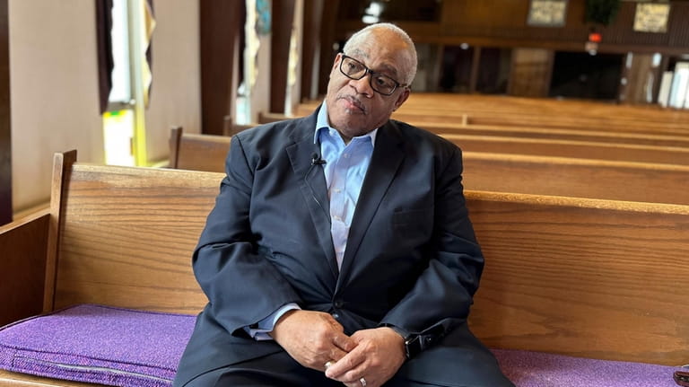 Bishop Hurley Coleman Jr. sits in his church on Tuesday,...